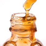 Apokathario oil pouring macro