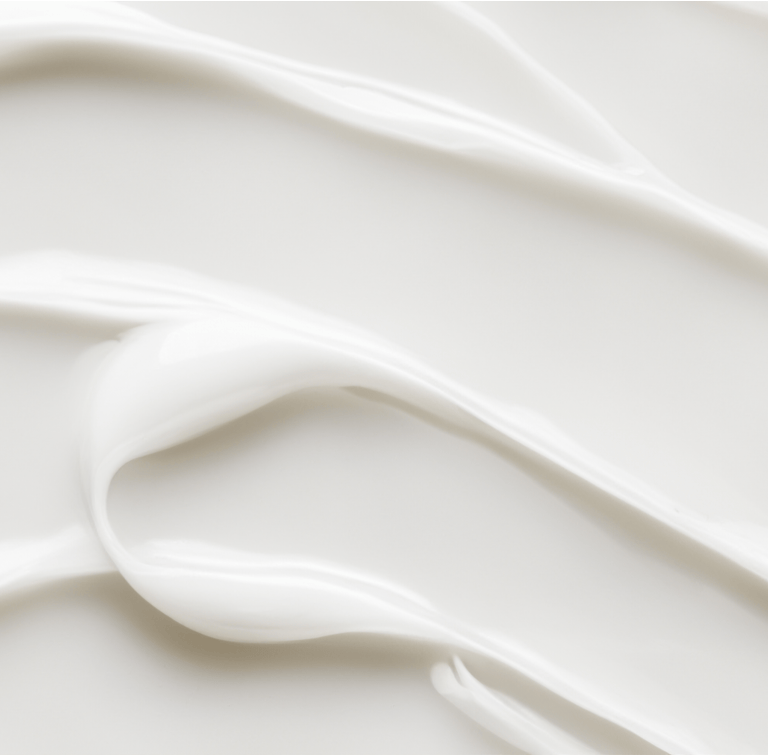 Creamy white lotion texture