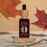 Natural exfoliator serum bottle with leaves