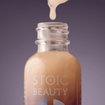Stoic Beauty best scalp serum dripping from bottle