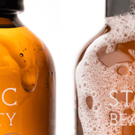 Soap bottles with visible foam.